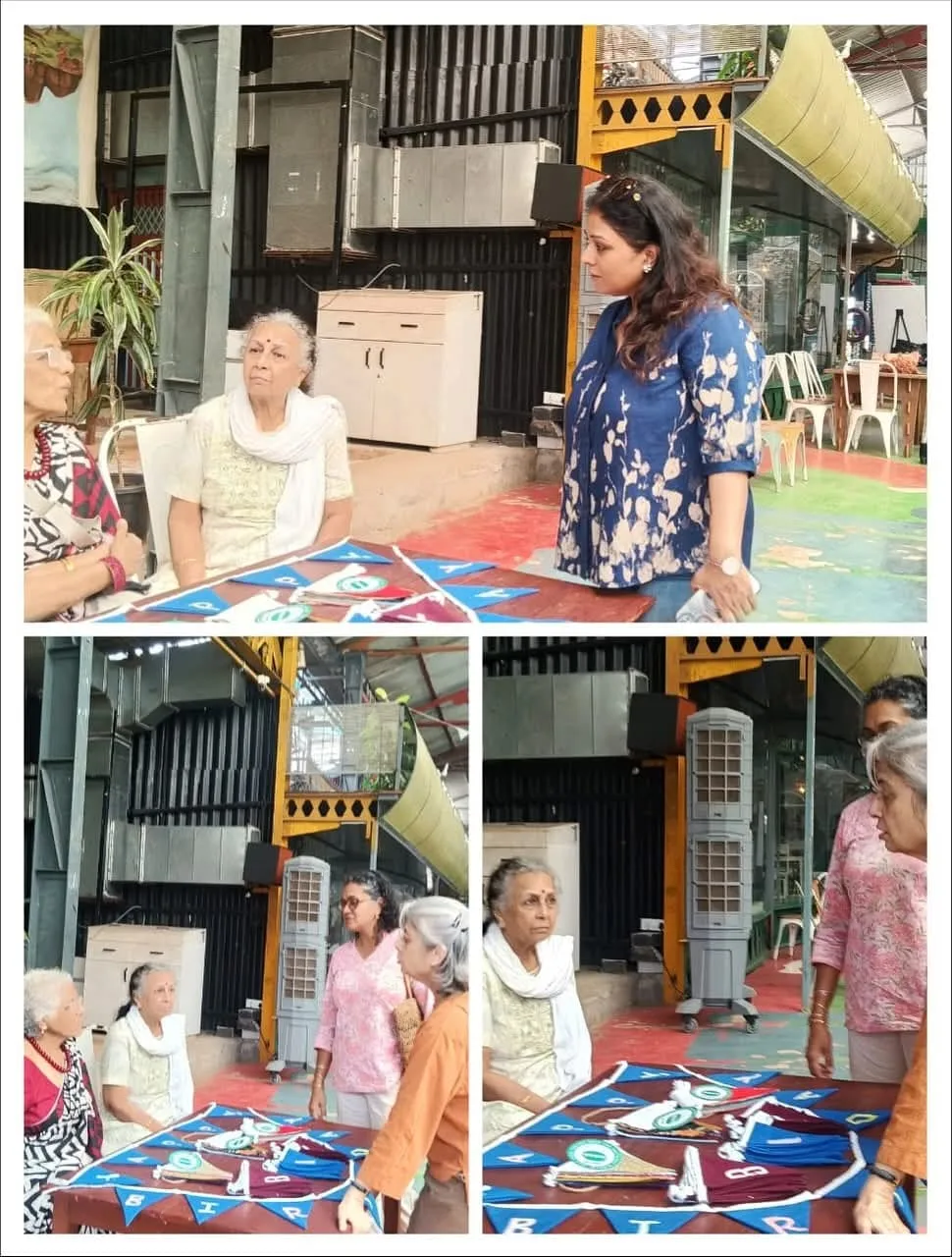 MITU volunteers and women at work around a table