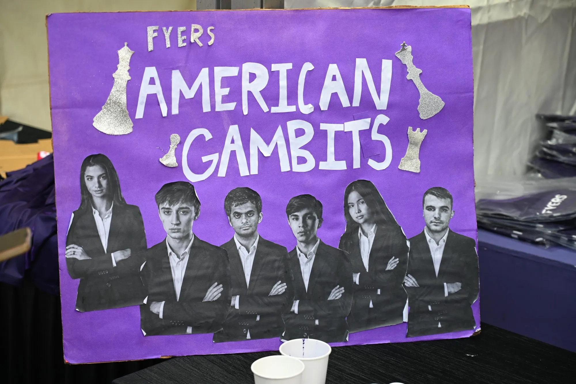 A hand-made American Gambits poster with cut-out photographs of the six players