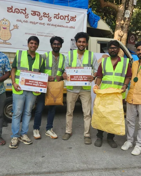 Volunteers in hi-vis vests with reusable bags at Kadalekayi Parishe