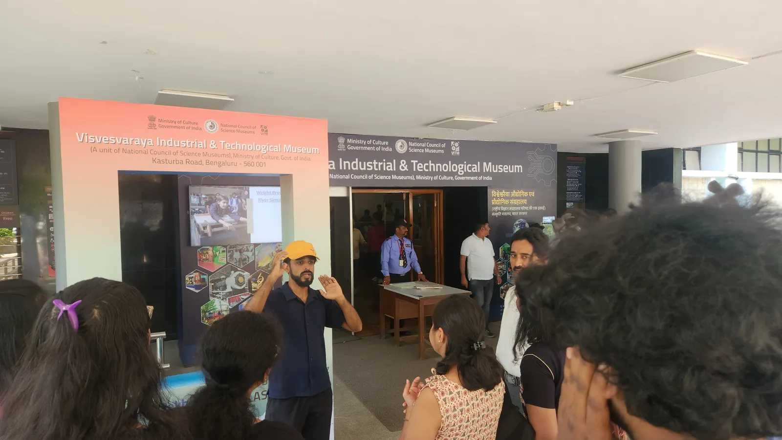 A Sceen coordinator briefing volunteers on-site during an event